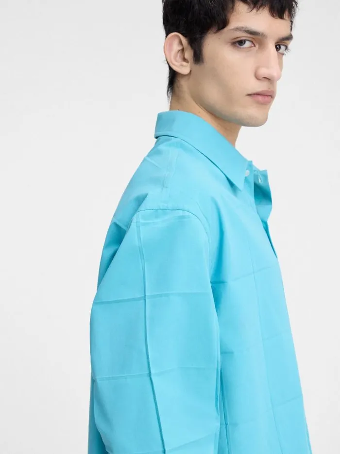 The Corto Shirt Turquoise Men JACQUEMUS Shirts The Corto Shirt Turquoise Men JACQUEMUS Shirts